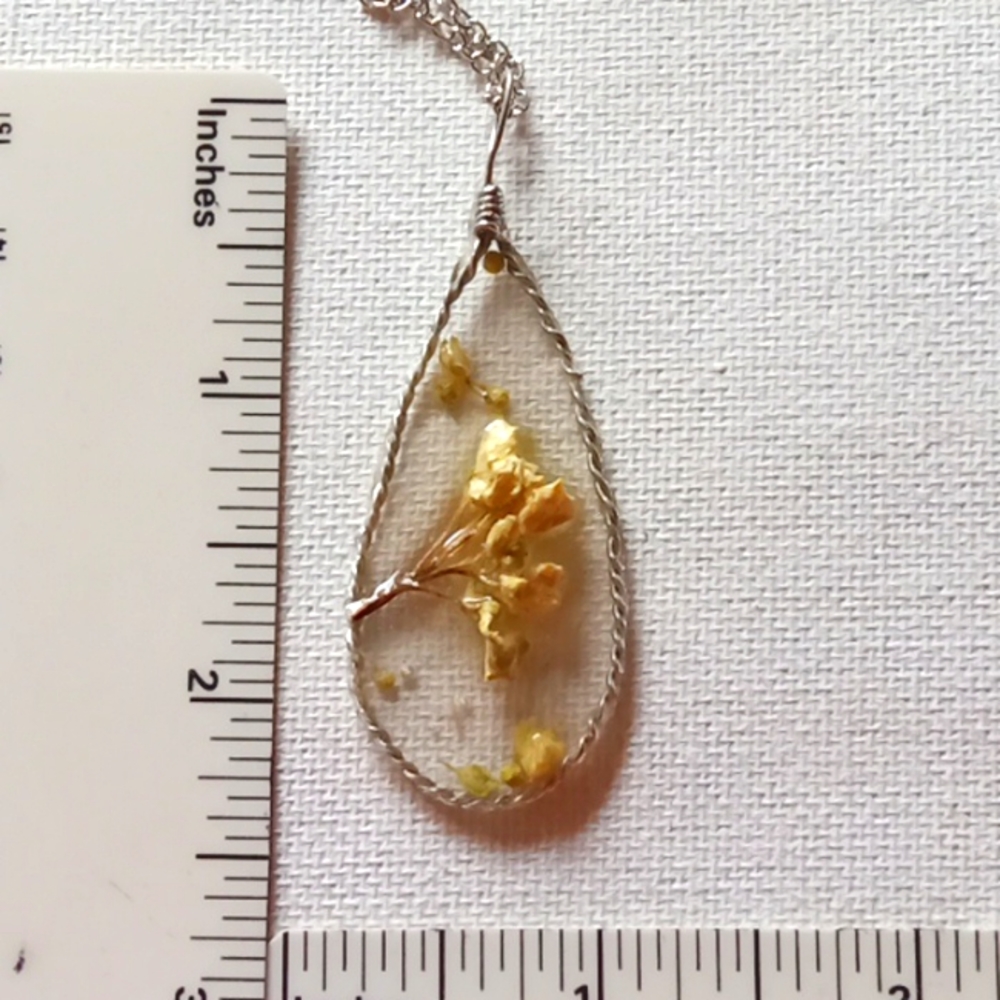 Floral necklace, amulet